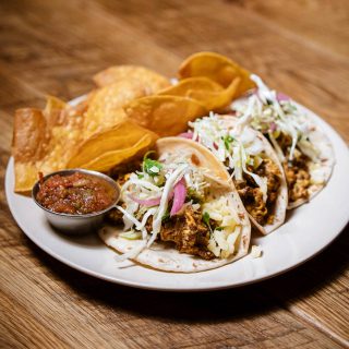 Braised pork street tacos with slaw and salsa